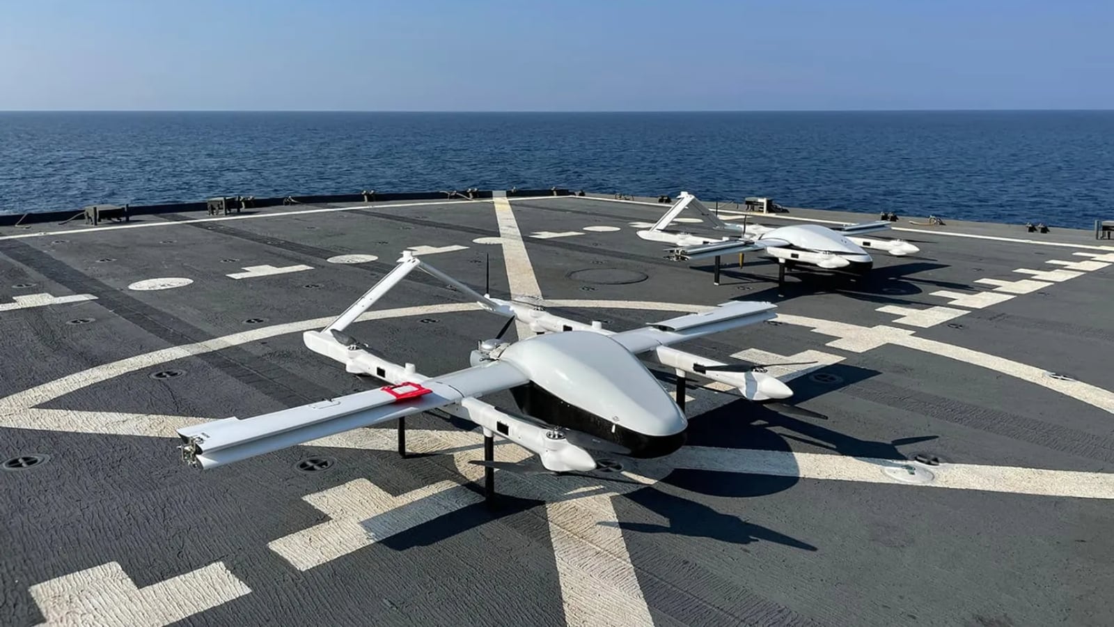 Skyways: fixed-wing delivery drones on a ship deck