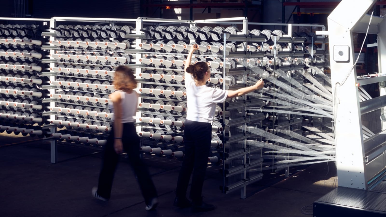 Unspun: technicians at work on a weaving line
